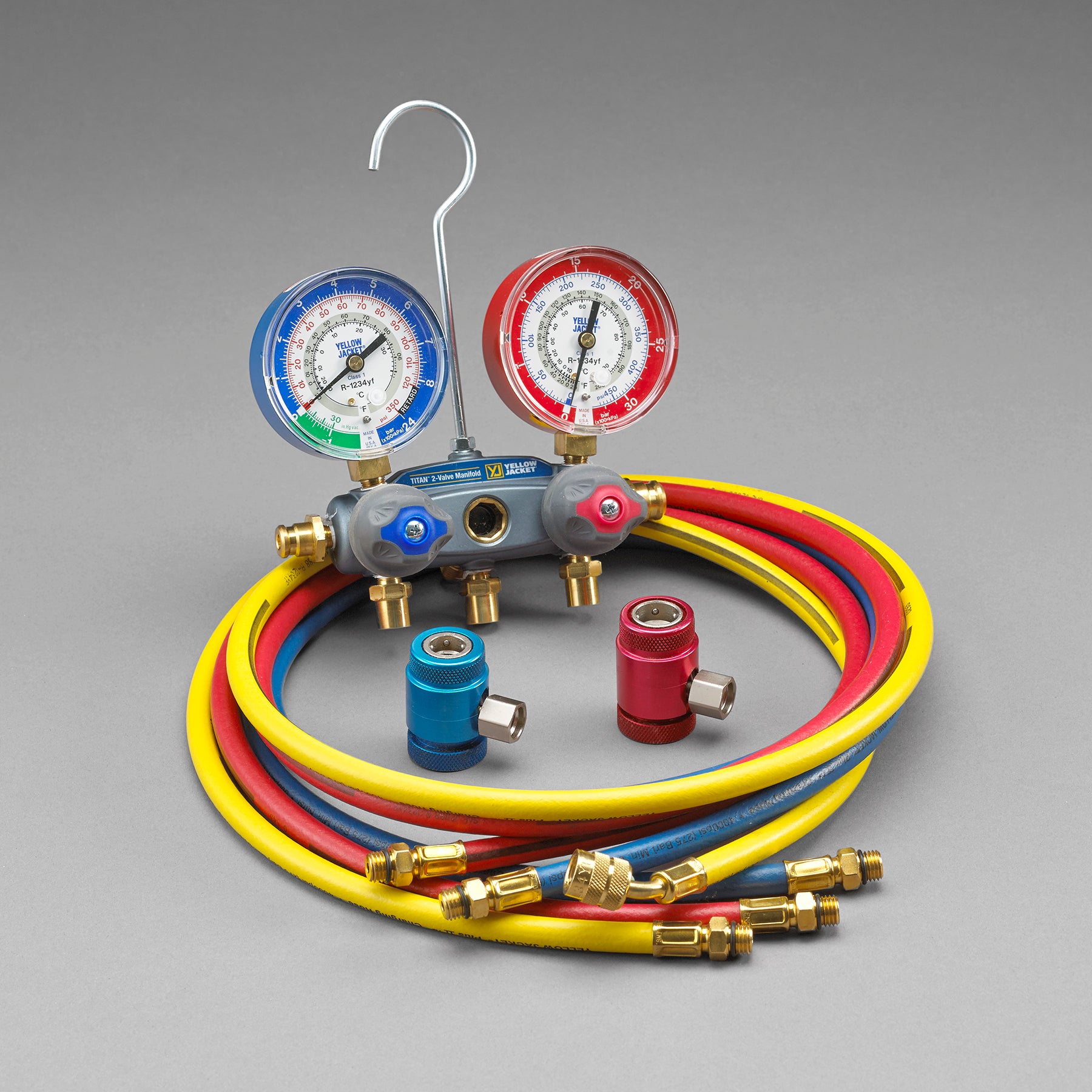 Yellow Jacket 49849 TITAN 2-Valve Manifold with 72″ PLUS II™ SAE RYB hoses with couplers, R/B gauges, bar/psi/kPa, R1234yf, °F - Edmondson Supply